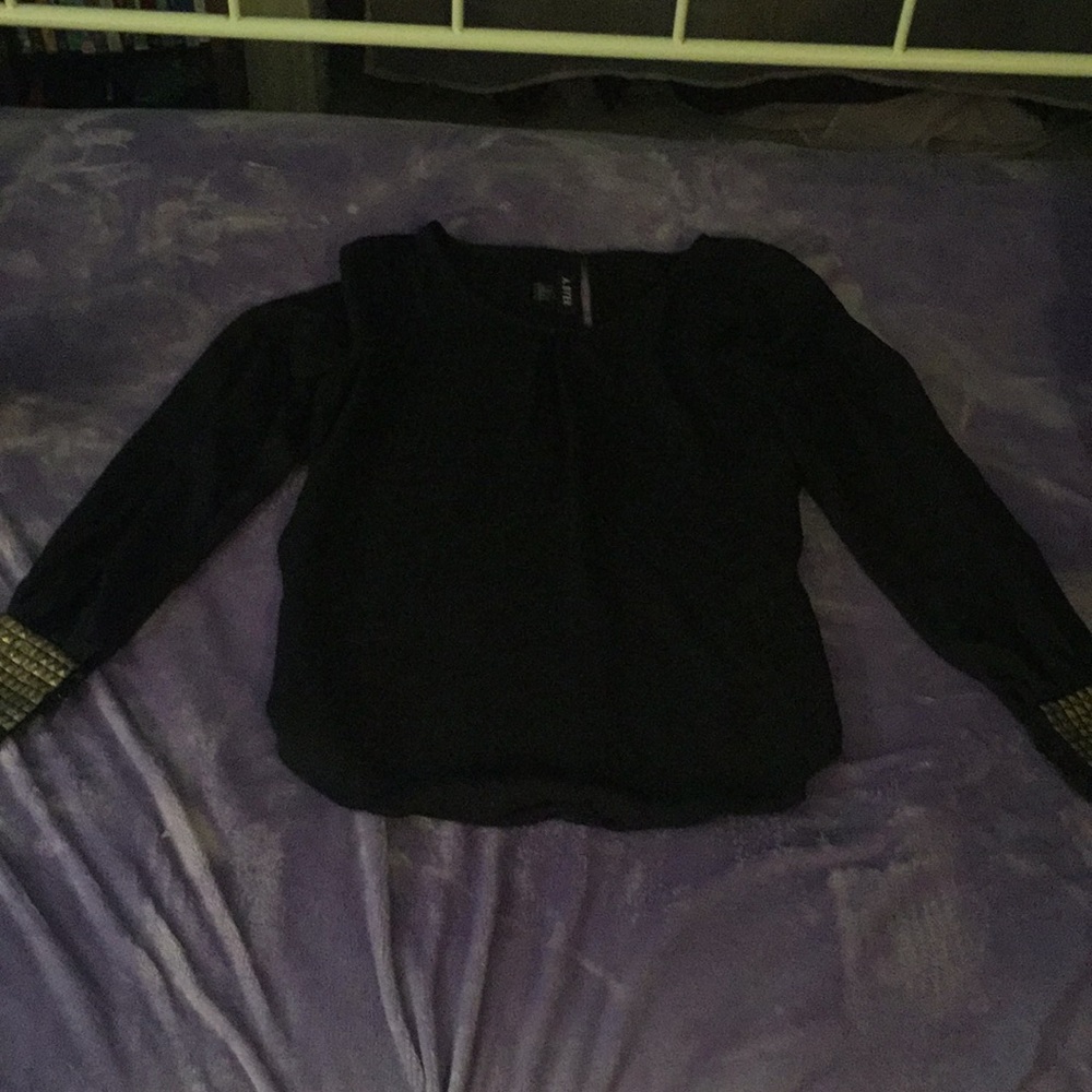 this shirt with gold ruffles